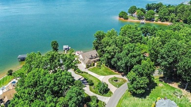 With sweeping open-water views, a private beach, and an - photo 7
