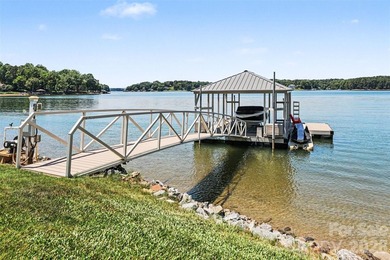 With sweeping open-water views, a private beach, and an - photo 8