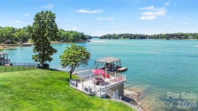 With sweeping open-water views, a private beach, and an - photo 9