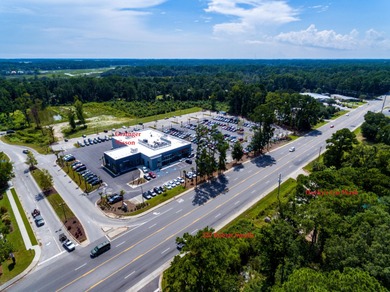 Prime location across from Lowes on HW 170 next to Zaxbys. Curb - photo 6