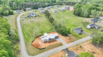 Quality new construction on a beautiful 1.7-acre corner lot! - photo 25