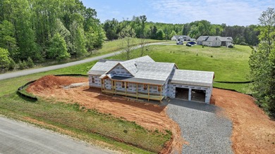 Quality new construction on a beautiful 1.7-acre corner lot! - photo 26