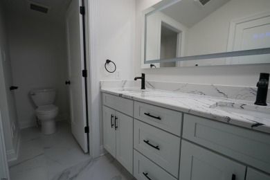 LUXURY NEW CONSTRUCTION in the well sought after PARKWAY SECTION