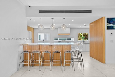 Located on one of Mid-Beach's most coveted tree-lined streets - photo 11
