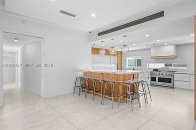 Located on one of Mid-Beach's most coveted tree-lined streets - photo 12