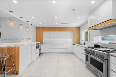 Located on one of Mid-Beach's most coveted tree-lined streets - photo 14
