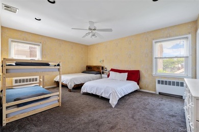 Nestled on a quiet, tree-lined block in the heart of Woodmere - photo 15