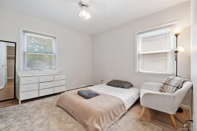 Nestled on a quiet, tree-lined block in the heart of Woodmere - photo 19