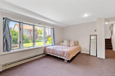 Nestled on a quiet, tree-lined block in the heart of Woodmere - photo 22