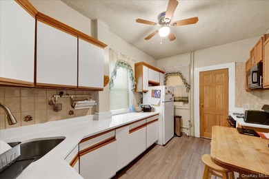 Potential rental income of approximately $10,00 per month makes - photo 7