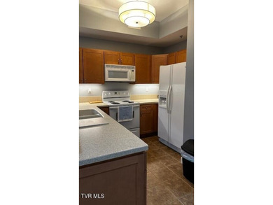 This beautiful condo is a 1 bedroom, 1 bathroom in a gated