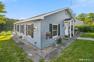 This lakeside escape was completely redone in 2023. This - photo 4