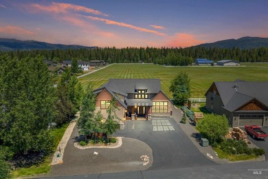 Set against a stunning backdrop of open pasture and mountain - photo 1