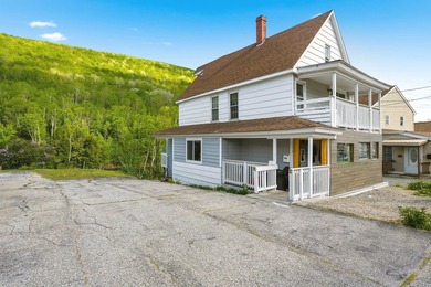 Nestled along the scenic Androscoggin River, this charming New - photo 1