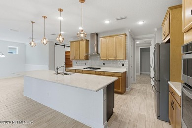 Welcome to this beautifully upgraded home in WaterSong at - photo 12