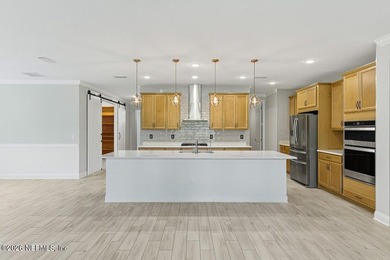 Welcome to this beautifully upgraded home in WaterSong at - photo 13