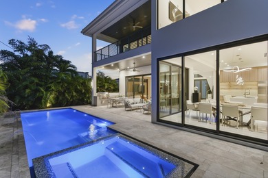 This extraordinary two-story estate is purpose-built for those