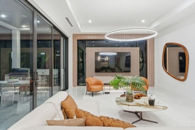 This extraordinary two-story estate is purpose-built for those - photo 21