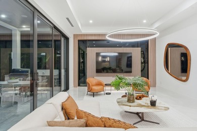 This extraordinary two-story estate is purpose-built for those