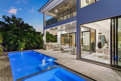 This extraordinary two-story estate is purpose-built for those