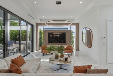 This extraordinary two-story estate is purpose-built for those