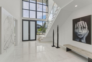 This extraordinary two-story estate is purpose-built for those