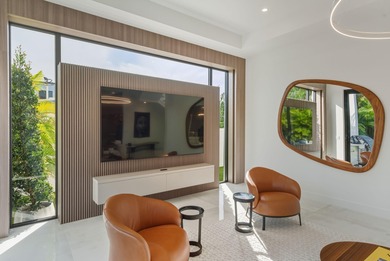 This extraordinary two-story estate is purpose-built for those