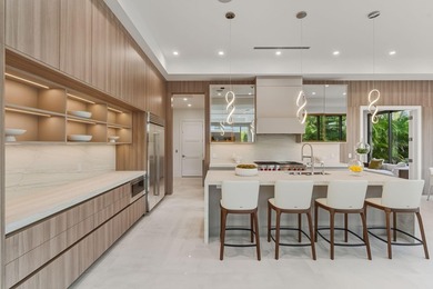 This extraordinary two-story estate is purpose-built for those - photo 33