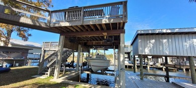 Welcome to effortless waterfront living in the peaceful, golf - photo 4