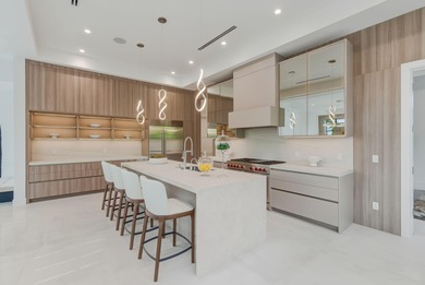 This extraordinary two-story estate is purpose-built for those