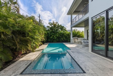 This extraordinary two-story estate is purpose-built for those