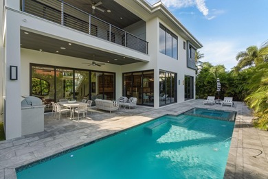 This extraordinary two-story estate is purpose-built for those