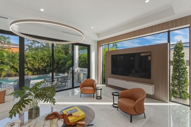 This extraordinary two-story estate is purpose-built for those