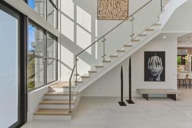 This extraordinary two-story estate is purpose-built for those - photo 50