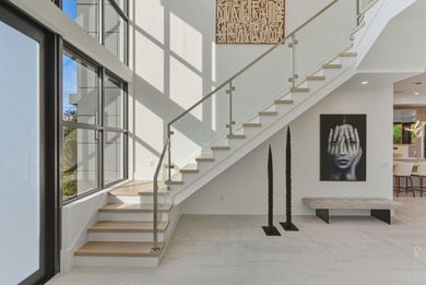 This extraordinary two-story estate is purpose-built for those