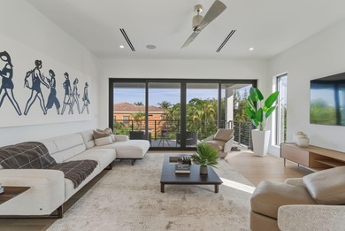 This extraordinary two-story estate is purpose-built for those