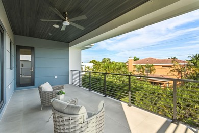 This extraordinary two-story estate is purpose-built for those