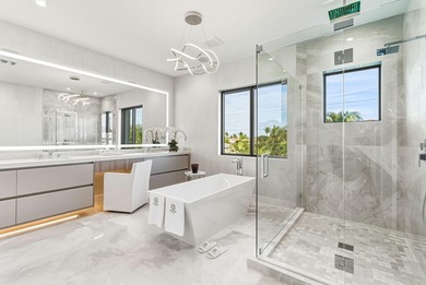 This extraordinary two-story estate is purpose-built for those