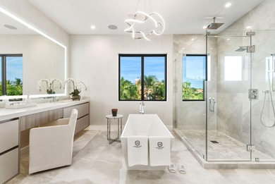 This extraordinary two-story estate is purpose-built for those