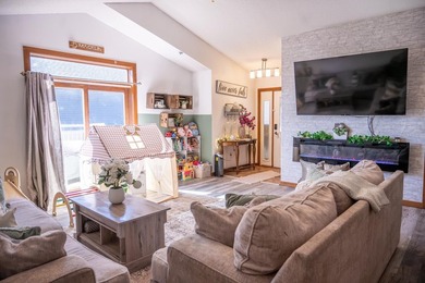 Each unit features a spacious, open~concept layout where the - photo 12