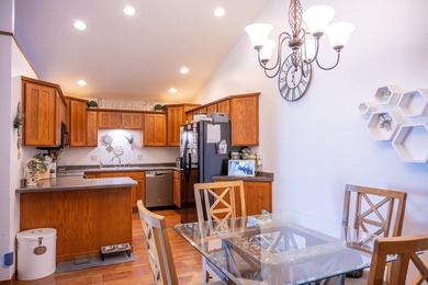 Each unit features a spacious, open~concept layout where the - photo 40
