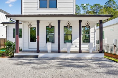 Discover the epitome of coastal luxury at 305 Elm St. in the - photo 3