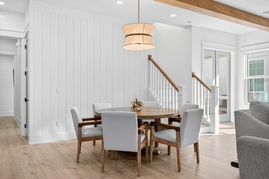 Discover the epitome of coastal luxury at 305 Elm St. in the - photo 7