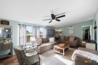 Canal-front turnkey coastal retreat with private fishing dock - photo 14