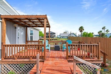 Canal-front turnkey coastal retreat with private fishing dock - photo 20