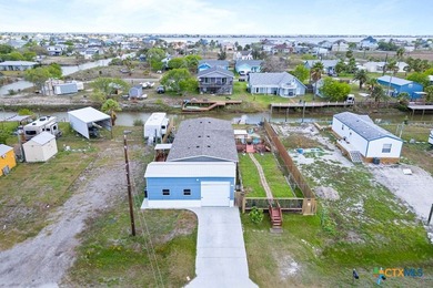 Canal-front turnkey coastal retreat with private fishing dock - photo 23