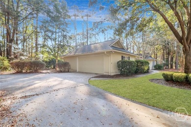 Experience the best of gated island living in this charming - photo 19