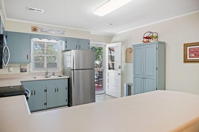 Just a short walk from the sand, this classic Edisto Beach home - photo 29