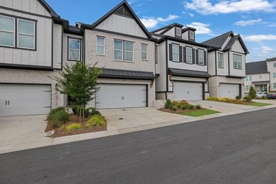 Experience luxury living in this beautifully upgraded townhome - photo 1