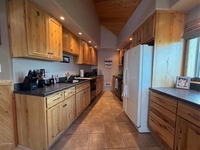 Impeccably maintained home with 125 feet of frontage on Blue Dog - photo 10